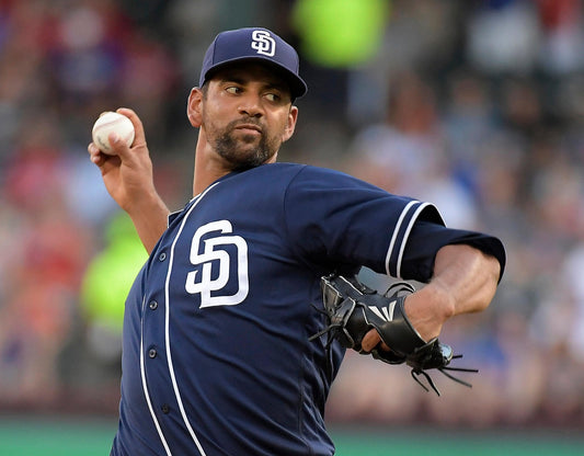 Image of Tyson Ross pitching a ball wearing the San Diego Padres uniform.